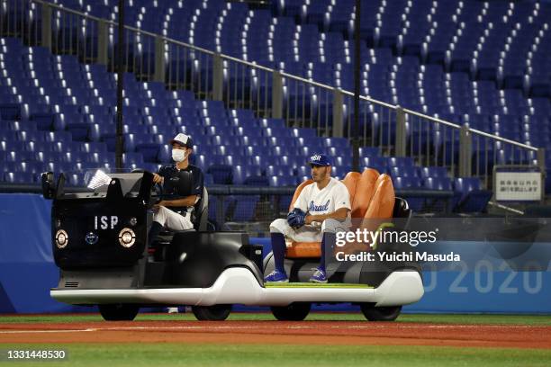 Jonathan De Marte of Team Israel enters the game from the bullpen cart in the sixth inning against Team United States during the baseball opening...