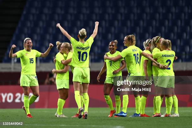 Olivia Schough of Team Sweden celebrates with teammates after victory in the Women's Quarter Final match between Sweden and Japan on day seven of the...