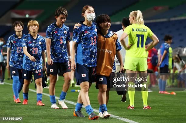 Yuzuho Shiokoshi of Team Japan looks dejected following defeat in the Women's Quarter Final match between Sweden and Japan on day seven of the Tokyo...