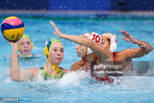 Hannah Buckling of Team Australia is challenged by Roser Tarrago Aymerich and Judith Forca Ariza of Team Spain during the Women's Preliminary Round...