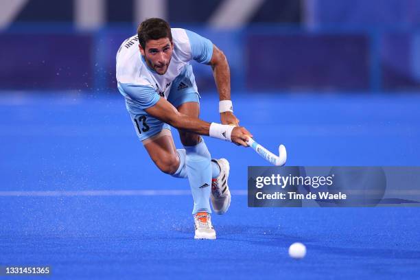 Jose Leandro Tolini of Team Argentina passes the ball during the Men's Preliminary Pool A match between Argentina and New Zealand on day seven of the...