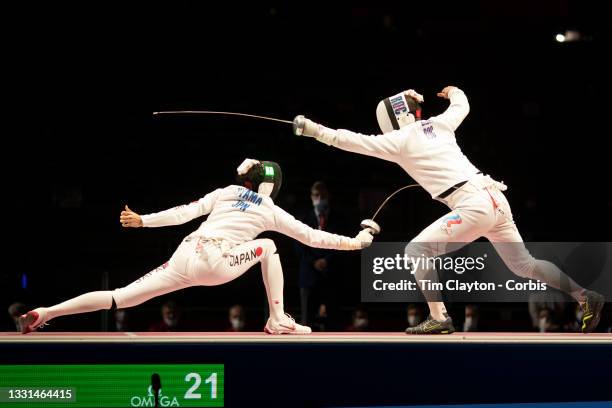 Satoru Uyama of Japan in action against Sergey Bida of ROC during the Japan V ROC gold medal match won by Japan 45-36 during the fencing epee team...