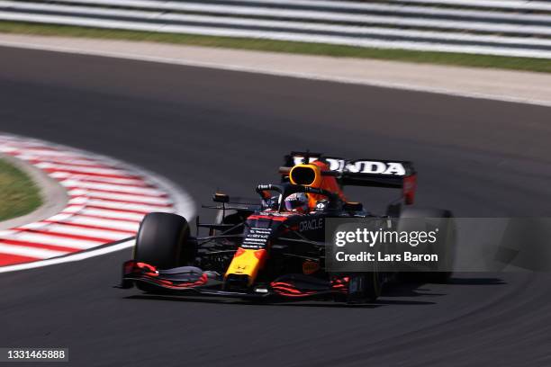 Max Verstappen of the Netherlands driving the Red Bull Racing RB16B Honda during practice ahead of the F1 Grand Prix of Hungary at Hungaroring on...