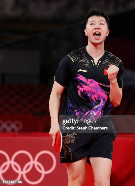 Ma Long of Team China reacts during his Men's Singles Gold Medal match on day seven of the Tokyo 2020 Olympic Games at Tokyo Metropolitan Gymnasium...