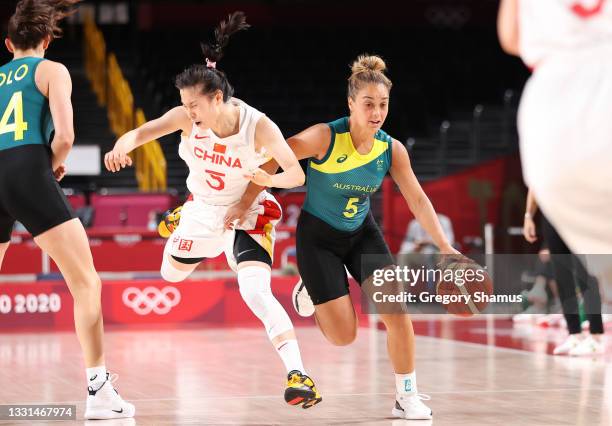 Leilani Mitchell of Team Australia drives past Siyu Wang of Team China during the second half of a Women's Basketball Preliminary Round Group C game...