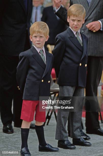 British Royals Prince Harry and his brother Prince William attend the Beating Retreat military ceremony, held in the Orangery of Kensington Palace in...