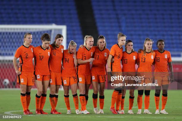 Players of Team Netherlands react during the penalty shoot out during the Women's Quarter Final match between Netherlands and United States on day...