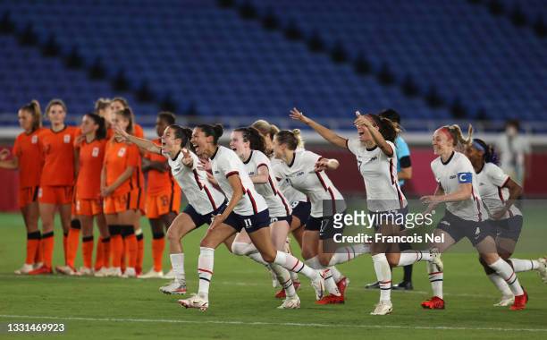 Players of Team United States celebrate following their team's victory in the penalty shoot out during the Women's Quarter Final match between...