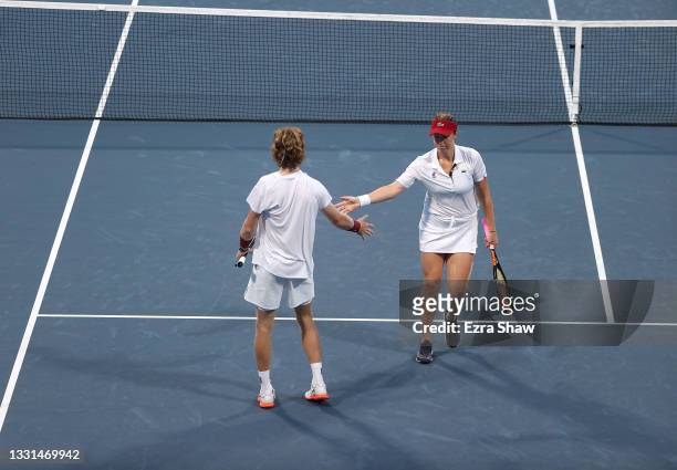 Andrey Rublev of Team ROC and Anastasia Pavlyuchenkova of Team ROC play Ashleigh Barty of Team Australia and John Peers of Team Australia in their...