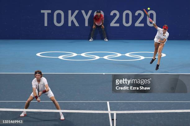 Andrey Rublev of Team ROC and Anastasia Pavlyuchenkova of Team ROC play Ashleigh Barty of Team Australia and John Peers of Team Australia in their...