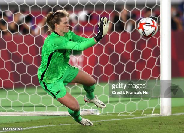 Alyssa Naeher of Team United States saves the fourth penalty from Aniek Nouwen of Team Netherlands during the Women's Quarter Final match between...
