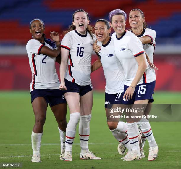 Crystal Dunn, Rose Lavelle, Christen Press, Megan Rapinoe and Alex Morgan of Team United States celebrate following their team's victory in the...