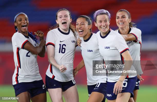 Crystal Dunn, Rose Lavelle, Christen Press, Megan Rapinoe and Alex Morgan of Team United States celebrate following their team's victory in the...