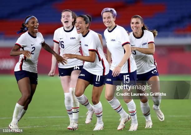 Crystal Dunn, Rose Lavelle, Christen Press, Megan Rapinoe and Alex Morgan of Team United States celebrate following their team's victory in the...