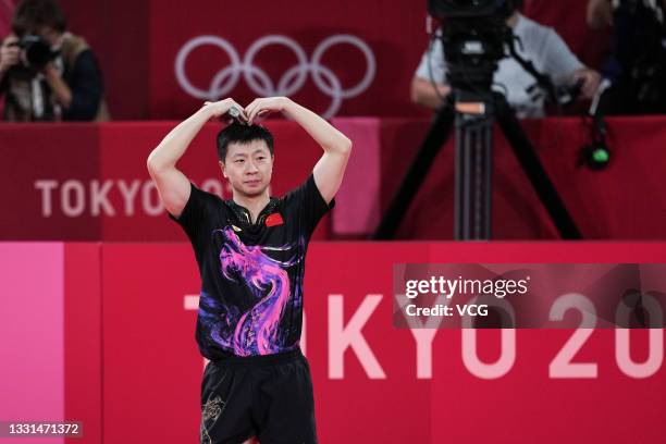 Ma Long of Team China celebrates after defeating Fan Zhendong of Team China during the Men's Table Tennis Singles Final match on day seven of the...