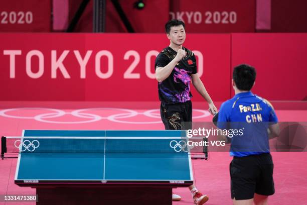 Ma Long of Team China celebrates after defeating Fan Zhendong of Team China during the Men's Table Tennis Singles Final match on day seven of the...