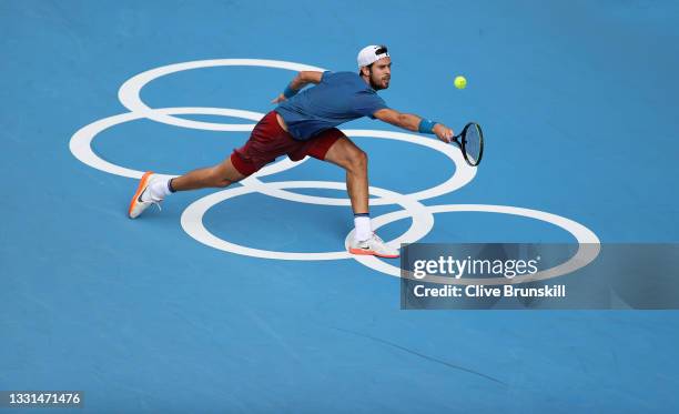 Karen Khachanov of Team ROC plays a backhand during his Men's Singles Semifinal match against Pablo Carreno Busta of Team Spain on day seven of the...