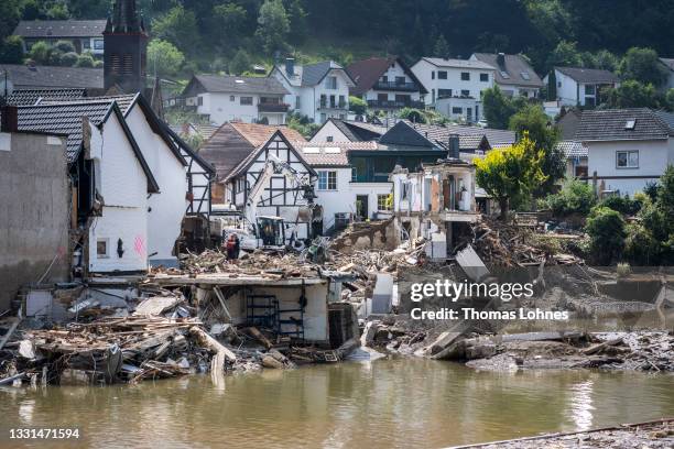 Destroyed houses and the river Ahr pictured one week after the after the devastating flood disaster on July 23, 2021 in Rech, Germany.