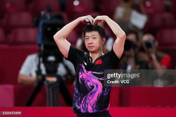 Ma Long of Team China celebrates after defeating Fan Zhendong of Team China during the Men's Table Tennis Singles Final match on day seven of the...