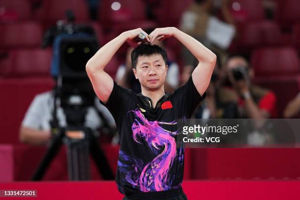 Ma Long of Team China celebrates after defeating Fan Zhendong of Team China during the Men's Table Tennis Singles Final match on day seven of the...