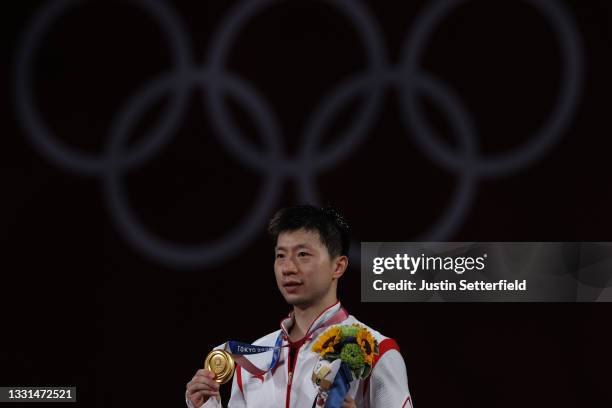 Ma Long of Team China poses with his medal after winning his Men's Singles Gold Medal table tennis match on day seven of the Tokyo 2020 Olympic Games...