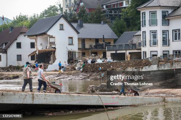 Destroyed houses and a bridge at the river Ahr pictured one week after the after the devastating flood disaster on July 23, 2021 in Dernau, Germany.