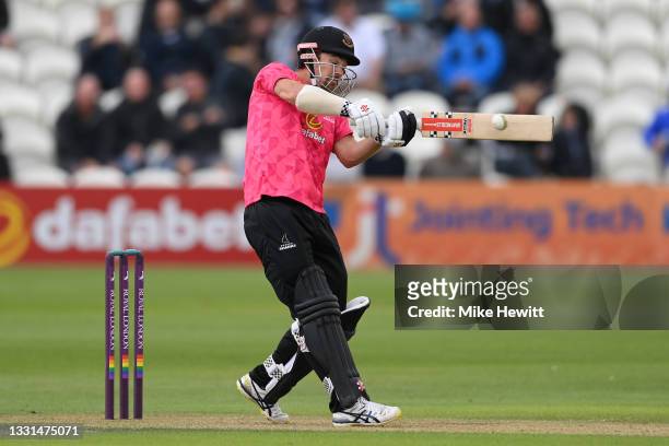 Tom Clark of Sussex hits a boundary during the Royal London Cup match between Sussex and Kent at The 1st Central County Ground on July 30, 2021 in...