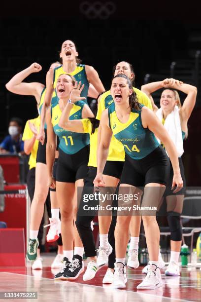 Marianna Tolo of Team Australia and her teammates celebrate from the bench during the second half of their Women's Basketball Preliminary Round Group...