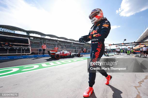 Max Verstappen of Netherlands and Red Bull Racing walks in the Pitlane during practice ahead of the F1 Grand Prix of Hungary at Hungaroring on July...