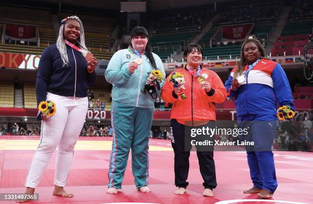 Bronze medalist B Romane Dicko of Team France, gold medalist Akira Sone of Team Japan, bronze medalist A Iryna Kindzerska of Team Azerbaijan and...