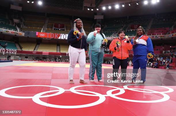 Bronze medalist B Romane Dicko of Team France, gold medalist Akira Sone of Team Japan, bronze medalist A Iryna Kindzerska of Team Azerbaijan and...