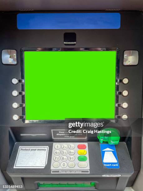 generic close up of cash machine with green screen chroma key display, london, uk - atm stock pictures, royalty-free photos & images