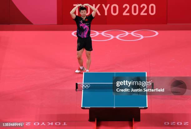 Ma Long of Team China celebrates winning his Men's Singles Gold Medal table tennis match on day seven of the Tokyo 2020 Olympic Games at Tokyo...