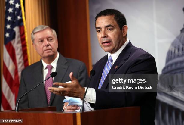 Rep. Henry Cuellar , joined by Sen. Lindsey Graham , speaks on southern border security and illegal immigration, during a news conference at the U.S....