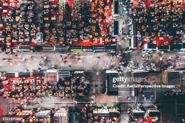 top view of night market and crowd of people at night - food street market stock pictures, royalty-free photos & images