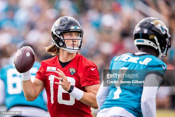Trevor Lawrence of the Jacksonville Jaguars looks to pass during Training Camp at TIAA Bank Field on July 30, 2021 in Jacksonville, Florida.