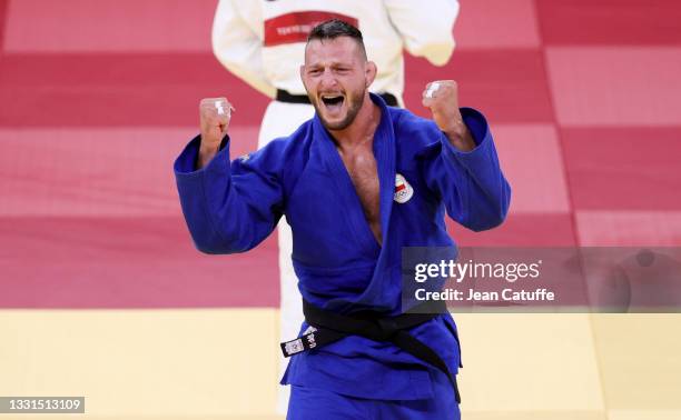 Lukas Krpalek of Czech Republic celebrates winning against Guram Tushishvili of Georgia in the Gold Medal match for the +100kg category during day...