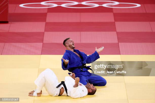 Lukas Krpalek of Czech Republic celebrates winning against Guram Tushishvili of Georgia in the Gold Medal match for the +100kg category during day...