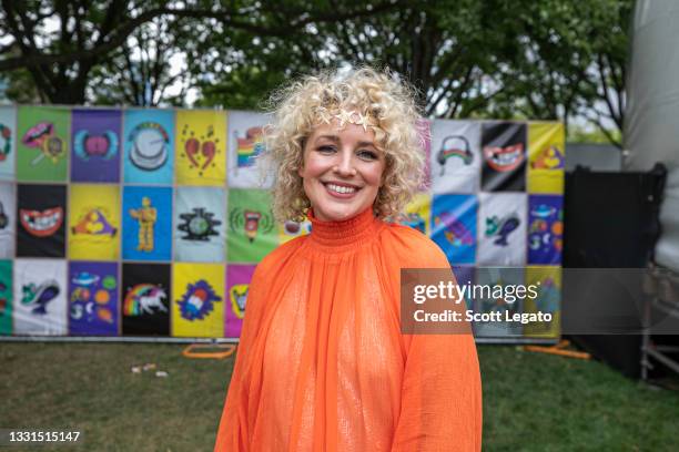 American country music singer and songwriter CAM poses backstage on day two of Lollapalooza at Grant Park on July 30, 2021 in Chicago, Illinois.