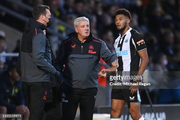 Newcastle manager Steve Bruce speaks to Joelinton of Newcastle during the pre-season friendly between Burton Albion and Newcastle United at the...