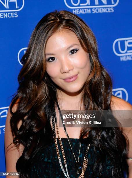 Actress Ally Maki poses with USANA during Kari Feinstein MTV Movie Awards Style Lounge at W Hollywood on June 2, 2011 in Hollywood, California.