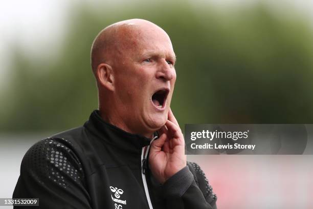 Simon Grayson, Manager of Fleetwood Town reacts during the Pre-Season Friendly match between Fleetwood Town and Leeds United at Highbury Stadium on...