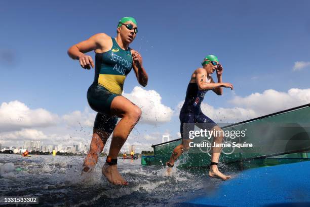 Summer Rappaport of Team United States and Emma Jeffcoat of Team Australia compete in the Mixed Relay Triathlon on day eight of the Tokyo 2020...