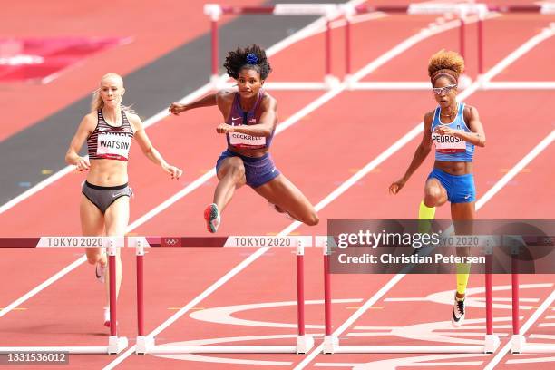 Anna Cockrell of Team United States competes against Sage Watson of Team Canada and Yadisleidis Pedroso of Team Italy in the Women's 400m Hurdles...