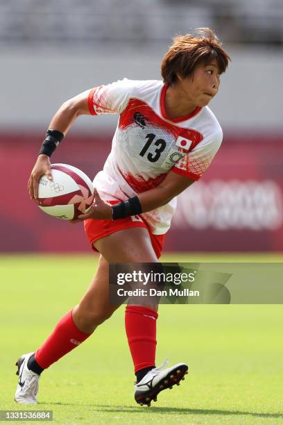 Mio Yamanaka of Team Japan runs with the ball in the Women’s Placing 11-12 match between Team Brazil and Team Japan during the Rugby Sevens on day...