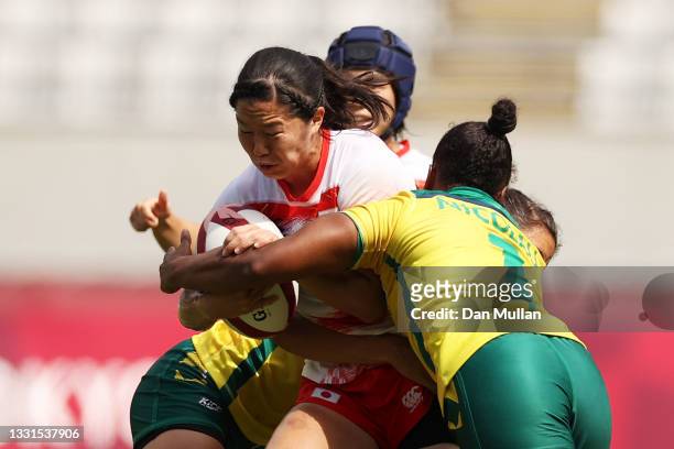 Mifuyu Koide of Team Japan is tackled in the Women’s Placing 11-12 match between Team Brazil and Team Japan during the Rugby Sevens on day eight of...