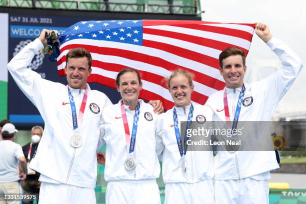 Morgan Pearson, Katie Zaferes, Taylor Knibb and Kevin McDowell of Team United States pose with their silver medals following the Mixed Relay...