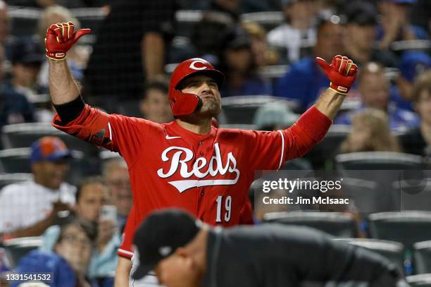 Joey Votto of the Cincinnati Reds celebrates after hitting a home run against the New York Mets in the sixth inning at Citi Field on July 30, 2021 in...