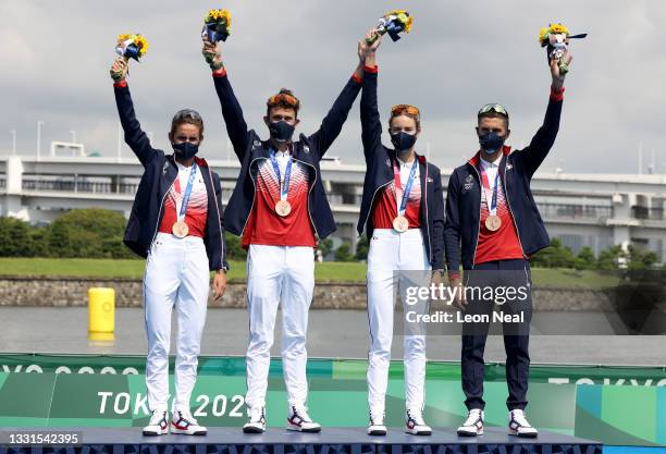 Bronze medalists Leonie Periault, Dorian Coninx, Cassandre Beaugrand and Vincent Luis of Team France pose with their medals on the podium during the...