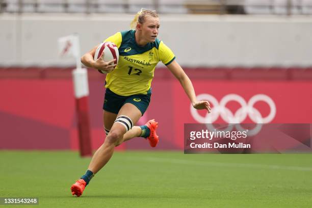 Maddison Levi of Team Australia scores a try in the Women’s Placing 5-8 match between Team ROC and Team Australia during the Rugby Sevens on day...